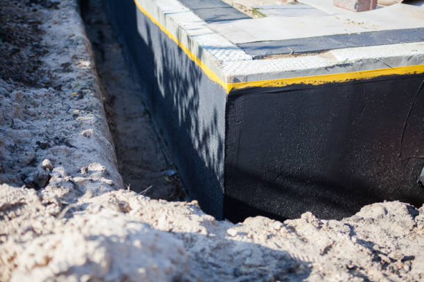 Professional Wet Basement Repair technician working in Tunnelton, IN